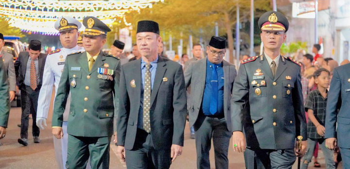 Polres Rohil Ikuti Upacara Pawai Obor HUT RI ke 79