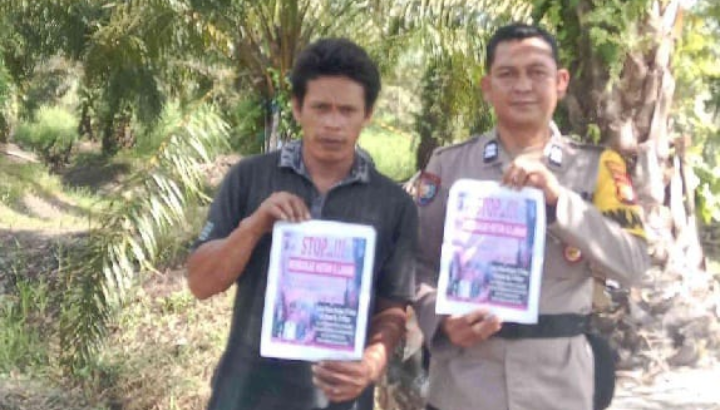 Kali Ini Polsek Pujud Sampaikan Larangan Membakar Hutan di Desa Tangga Batu
